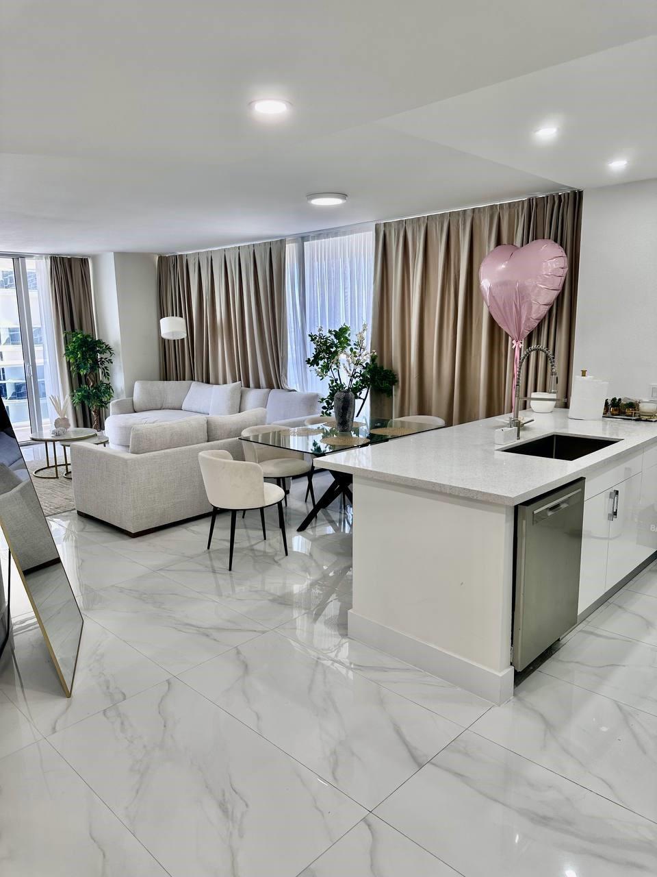 Available Now! Rarely offered Southeast corner unit with wraparound balcony and breathtaking views of the ocean, Intracoastal, and city lights.
This fully remodeled 2-bedroom residence features brand-new walls, floors, tiles, 2 elegant bathrooms, modern kitchen with high-end appliances, and all new furniture. Stylishly furnished and decorated, the apartment is move-in ready and stocked with everything — from 3 smart TVs and kitchenware to linens and essentials. Washer & dryer inside.
Located in a resort-style oceanfront building with 50,000-sf spa, fitness center, on-site restaurant/bar, 5 heated pools and full beach service. Just bring your suitcase!