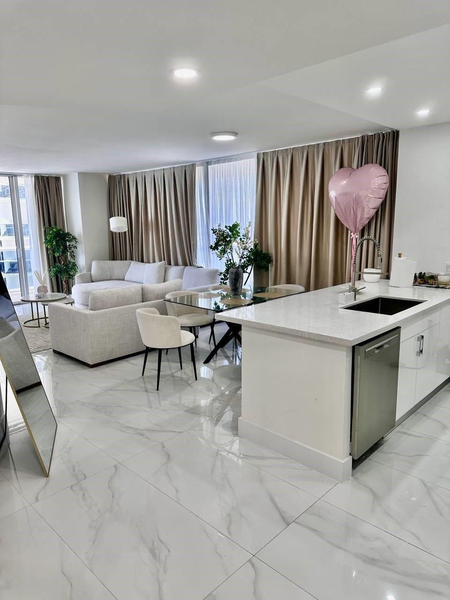 Available Now! Rarely offered Southeast corner unit with wraparound balcony and breathtaking views of the ocean, Intracoastal, and city lights.
This fully remodeled 2-bedroom residence features brand-new walls, floors, tiles, 2 elegant bathrooms, modern kitchen with high-end appliances, and all new furniture. Stylishly furnished and decorated, the apartment is move-in ready and stocked with everything — from 3 smart TVs and kitchenware to linens and essentials. Washer & dryer inside.
Located in a resort-style oceanfront building with 50,000-sf spa, fitness center, on-site restaurant/bar, 5 heated pools and full beach service. Just bring your suitcase!
