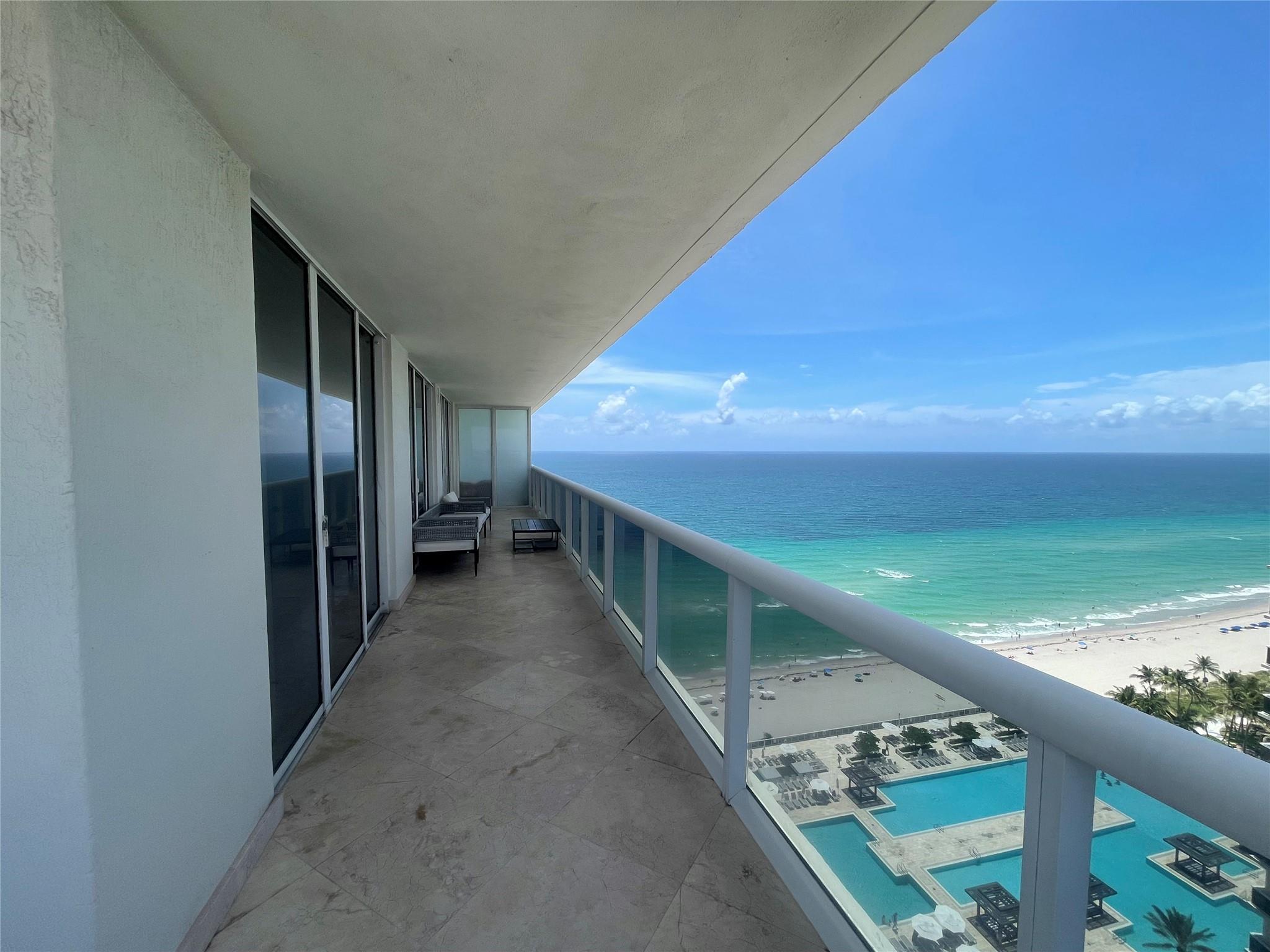 Vacant till May,15! Immaculate Southeast corner unit with wraparound balcony, offering stunning ocean views, Intracoastal, and city lights. This 2-bedroom unit has been remodeled with new master and second bathroom, kitchen, appliances, paint, new floors, countertops, and door handles. Washer and dryer inside unit. Stylishly furnished and decorated, this apartment is fully equipped with everything needed for a comfortable life, including 73 items of decor, interior items, household necessities, 3 TVs, kitchenware, beddings and essentials -from a coffee machine to cotton swabs and cleaning supplies, every detail has been thought of. Luxurious resort-style building with great amenities like the 50,000-sf oceanfront spa, fitness center, restaurant/bar, 5 heated pools and beach service.