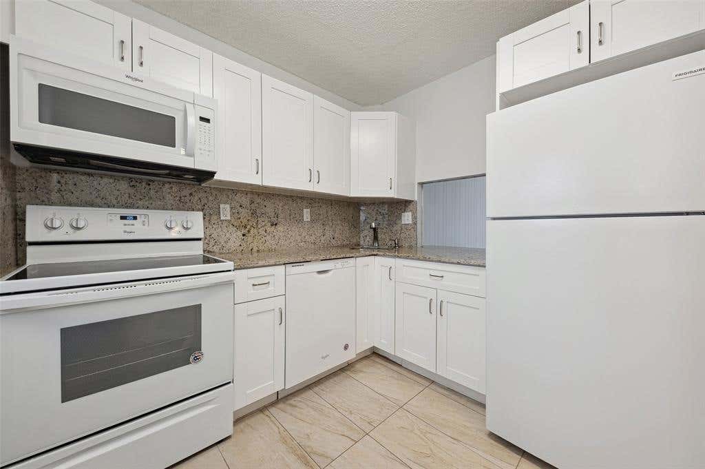 Photo of 4501 NE 21ST AVE #109, Fort Lauderdale, FL 33308 (MLS # B26065049)