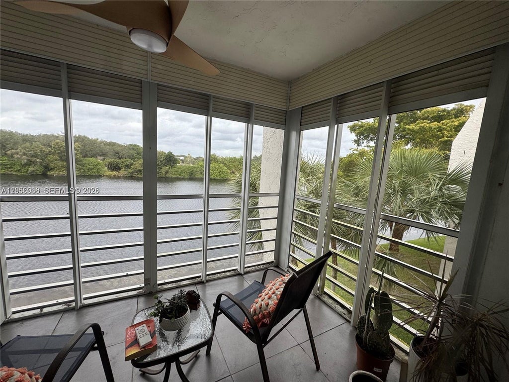 Photo of 9450 Poinciana Place #405, Davie, FL 33324 (MLS # A12056938)
