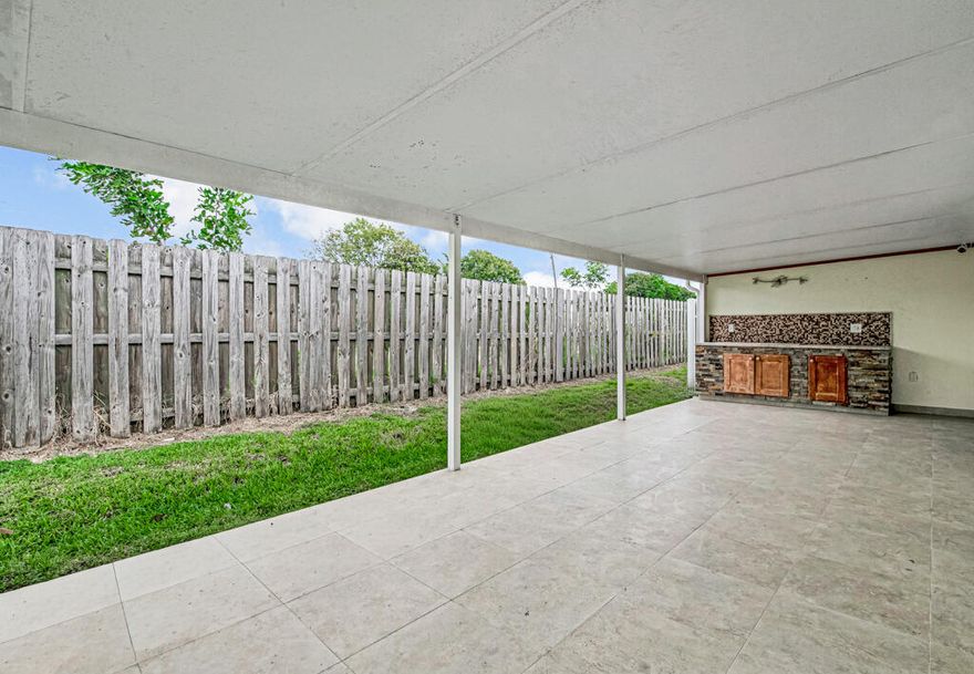 Situated in West Palm Beach, 4917 Luqui Court is a 1,178-square-foot townhome featuring a nicely updated two bedrooms and two bathrooms with durable masonry construction. The 1981-built, single-story home includes an attached garage and offers low-maintenance living within a community featuring affordable HOA fees.