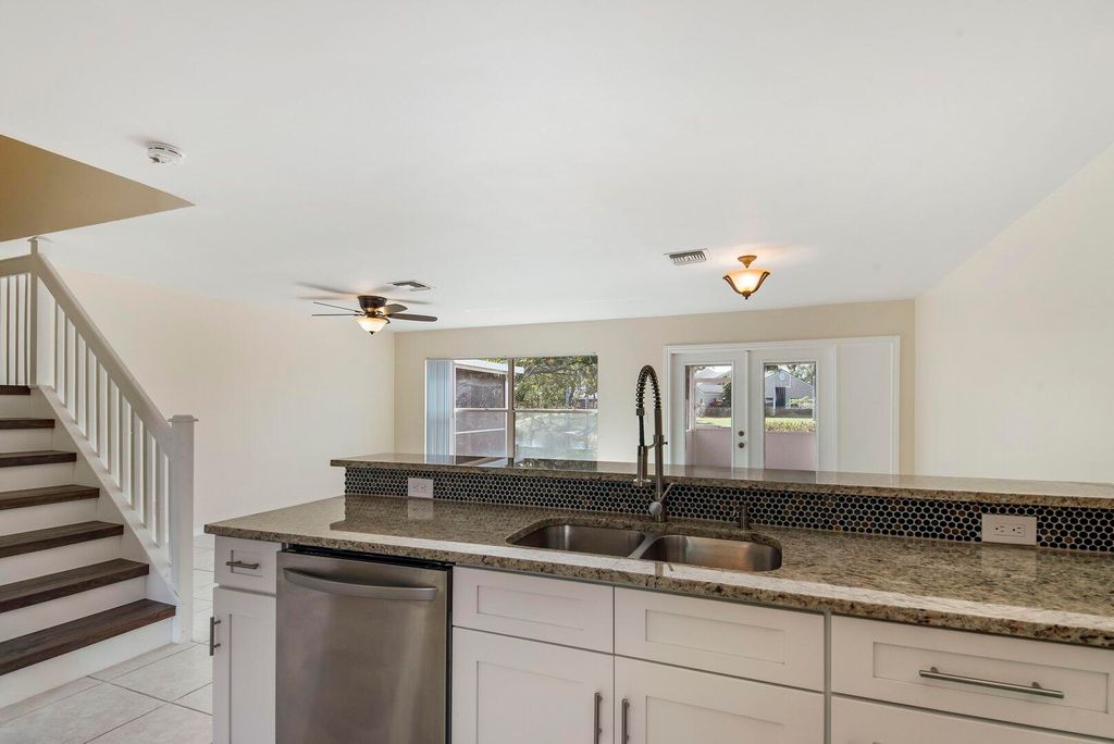 Photo of 1132 W Lakes Drive, Deerfield Beach, FL 33442 (MLS # R11100099)