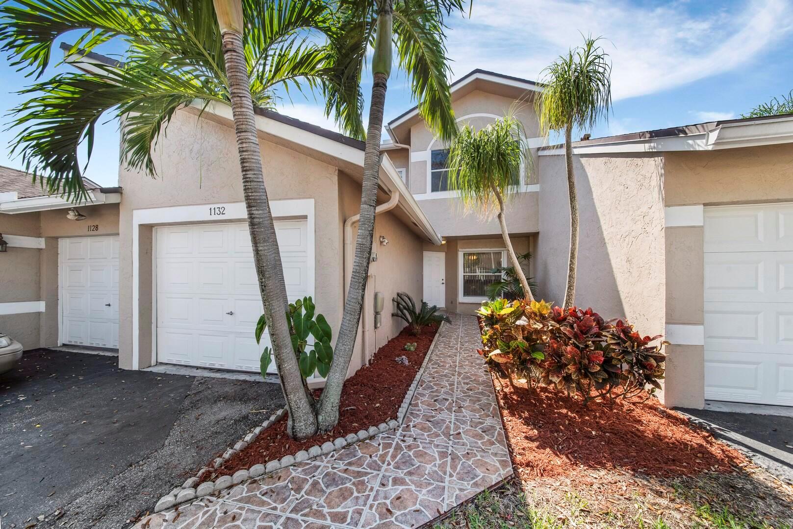 You will be inspired by this beautifully remodeled 2 bedroom, 2,5 bath townhome with a serene lake view. Dream kitchen with white shaker cabinetry with soft close drawers, granite countertops, tiled backsplash, custom above cabinet lighting, stainless steel appliances and a snack bar. Plenty of room to entertain with a living area, dining area and a large screen enclosed patio. On the 2nd floor you will find two bedrooms with en-suite baths, vaulted ceilings and wood laminate flooring. Spend quality time on the large screen enclosed patio overlooking your tranquil lake view. This freshly painted home also features neutral tile, upgraded bathrooms and an abundance of natural light. Crystal Key Pointe boasts first class amenities which include a clubhouse, resort style pool and tennis