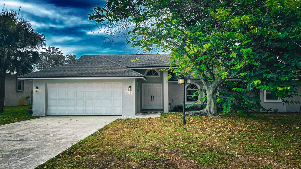 Photo of 1813 NE Acapulco Drive, Jensen Beach, FL 34957 (MLS # R11019891)