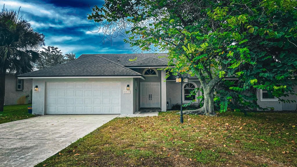 Photo of 1813 NE Acapulco Drive, Jensen Beach, FL 34957 (MLS # R11019891)