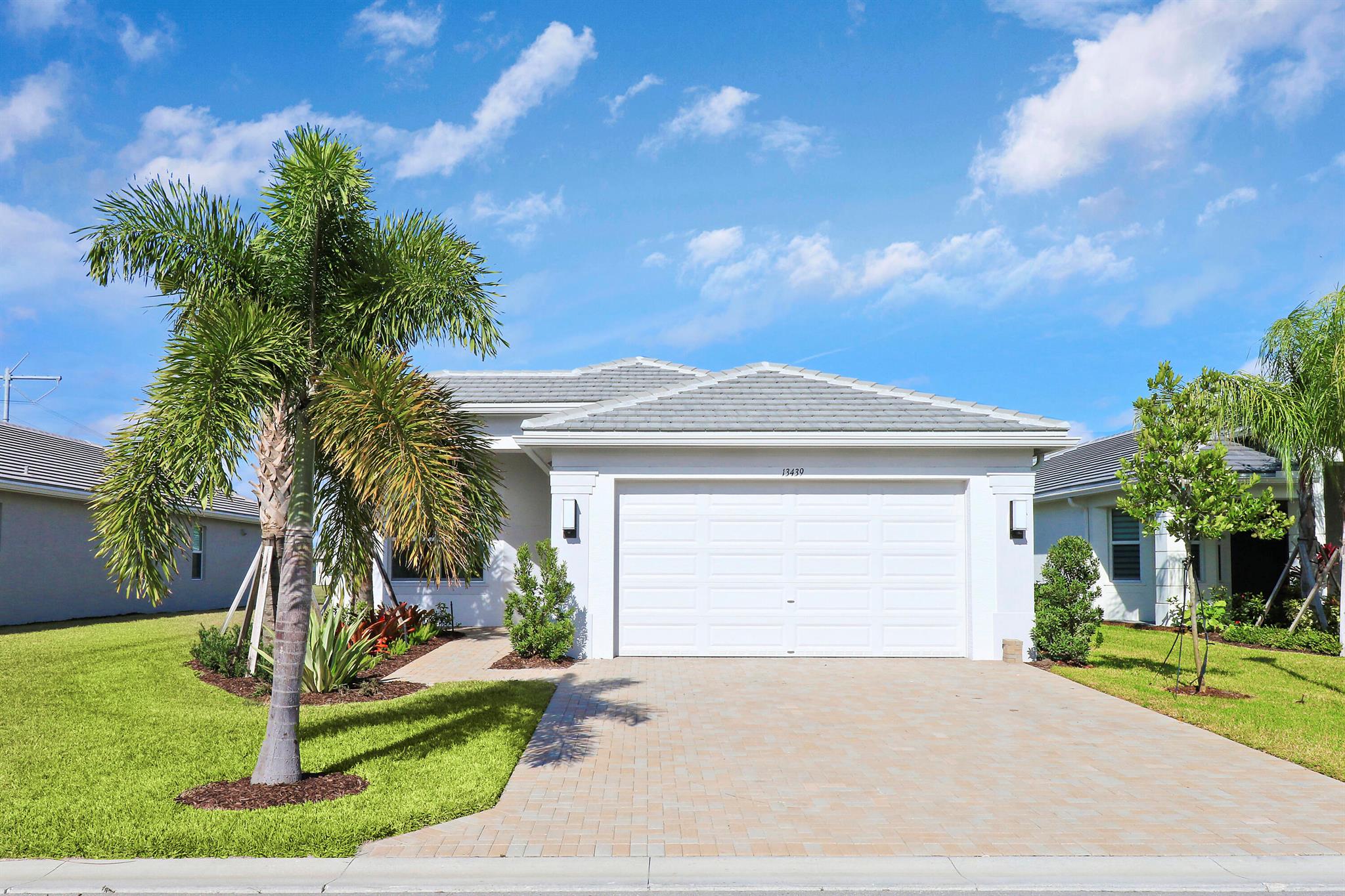 Welcome to Valencia Grove at Riverland - where comfort meets community living. This beautifully upgraded 3-bedroom, 2-bath home isn't just move-in ready--it's designed for effortless, elevated living. As you step through the front door, you're greeted by a bright, welcoming foyer and a tranquil view of the lake just beyond. Thoughtfully designed with impact-rated windows and sleek porcelain tile throughout, this home blends style and practicality at every turn.The kitchen is truly the heart of the home, featuring quartz countertops and backsplash, a large center island, pantry, and a vented hood--perfect for everyday meals or weekend hosting. The spacious primary suite offers not only a generous walk-in closet but also a full wall-to-wall second closet. The ensuite bath feels like