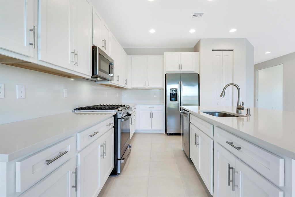 Photo of 13439 SW River Rock Road, Port Saint Lucie, FL 34987 (MLS # R11097204)