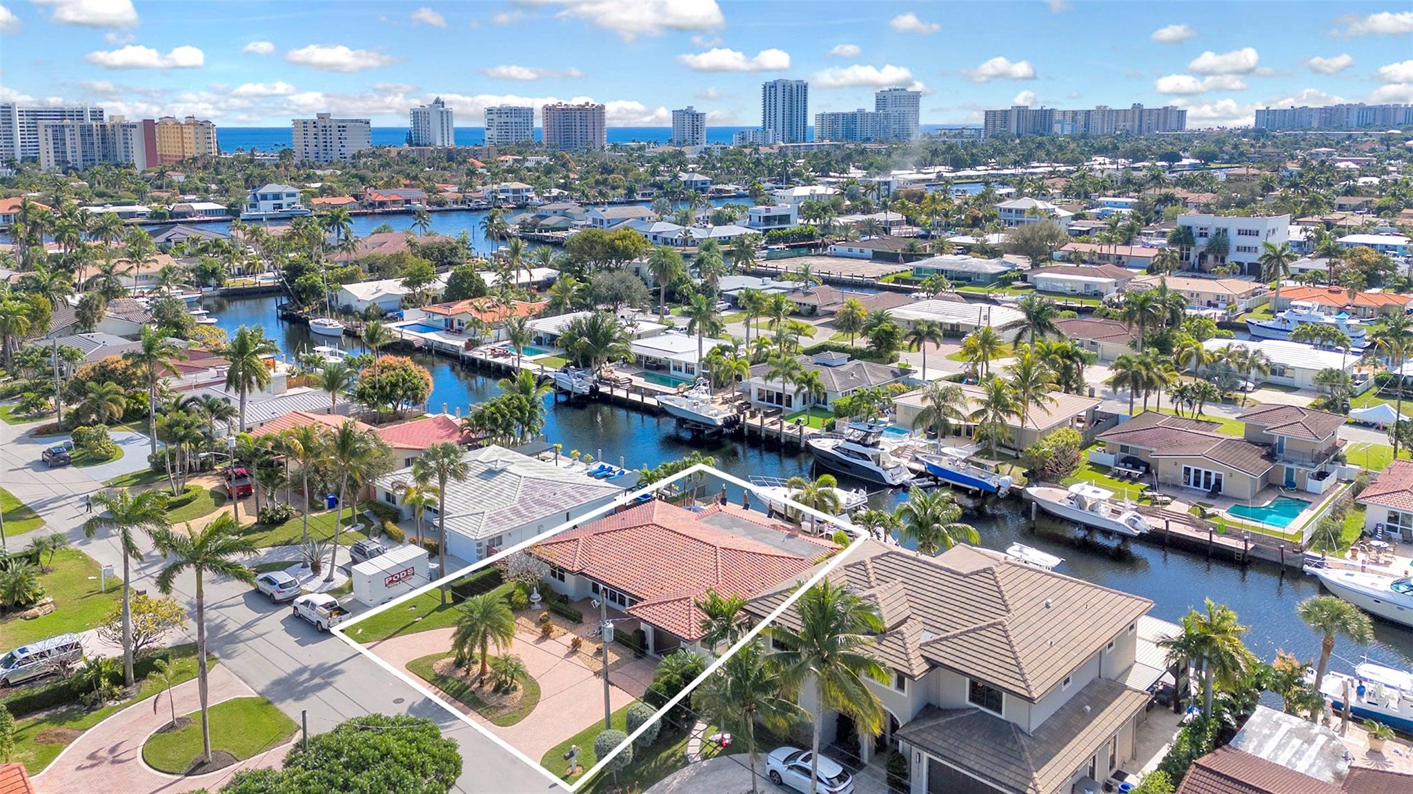 Boaters –Straight to the ocean! 2408 sq 3/2 updated sitting on 75’. Remodeled kitchen with natural gas, dining, living and a huge family room. Brand new AC, full impact glass, newer dock with reinforced pylons and seawall adding 2’ in additional height and width. South east facing (for sun all day) heated saltwater pool. Retractable sunshades on the front and the back, 22kw generator, PVC fencing, additional sheds, the entire interior is newly panted and all the plumbing has been replaced. This home is turn key, nothing to do! Come and enjoy all Pompano has to offer and your boat!!
