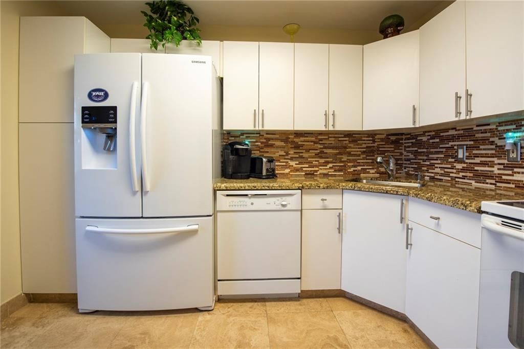 Photo of 3510 Oaks Way #706, Pompano Beach, FL 33069 (MLS # F10252075)