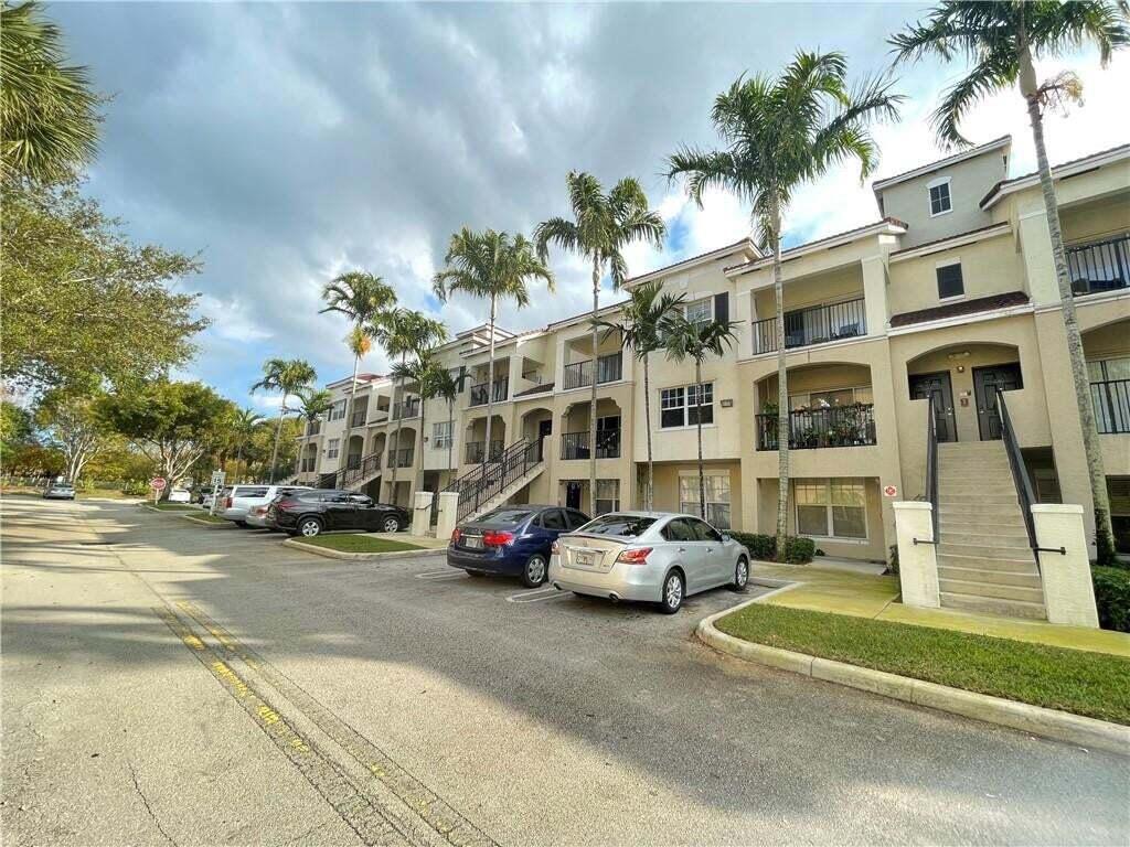 Photo of 5820 W Sample Road #305, Coral Springs, FL 33063 (MLS # B26070837)