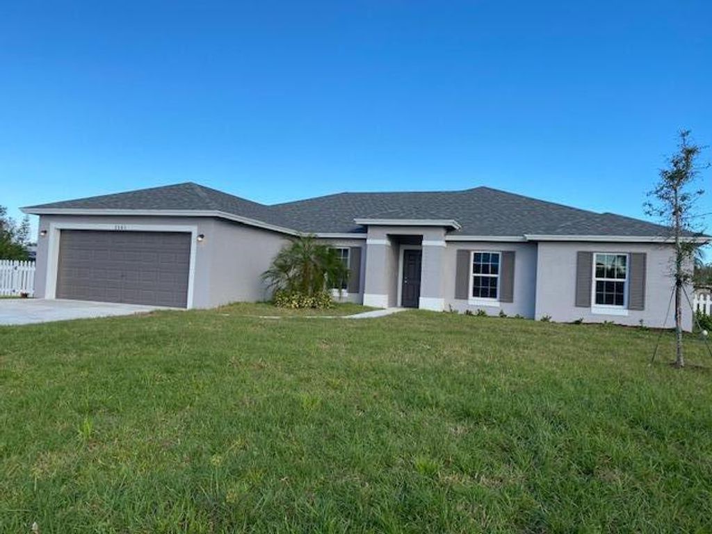 Photo of 2501 SE Mariposa Avenue, Port Saint Lucie, FL 34952 (MLS # R10765529)