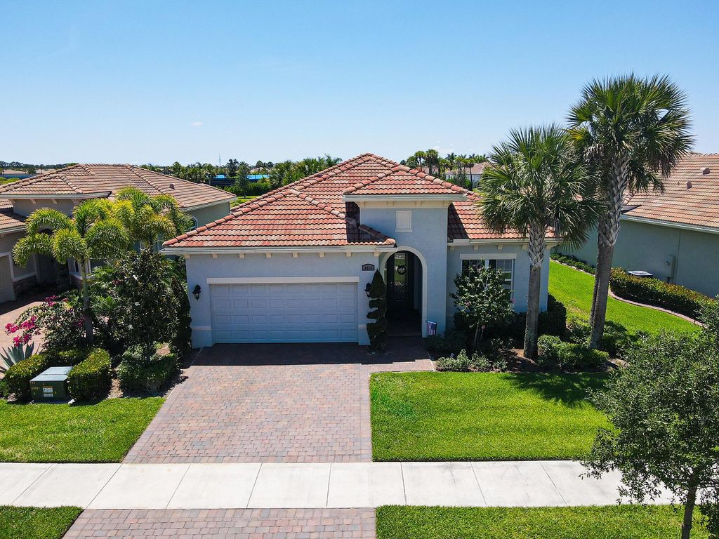Photo of 8653 SW Carrara Way, Port Saint Lucie, FL 34987 (MLS # R10990629)