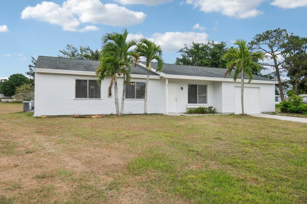 Photo of 671 SW Old Briar Avenue, Port Saint Lucie, FL 34953 (MLS # F10502290)