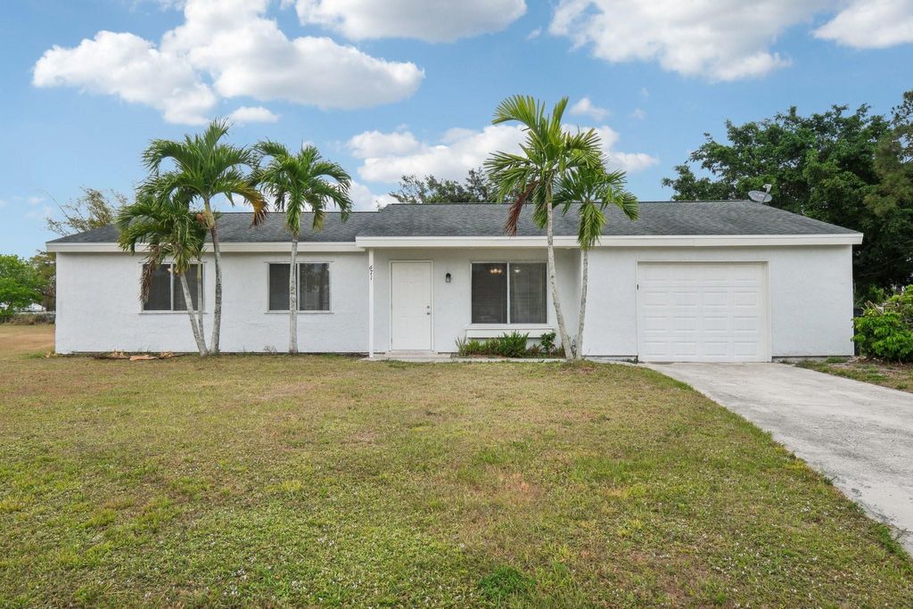 Photo of 671 SW Old Briar Avenue, Port Saint Lucie, FL 34953 (MLS # F10502290)