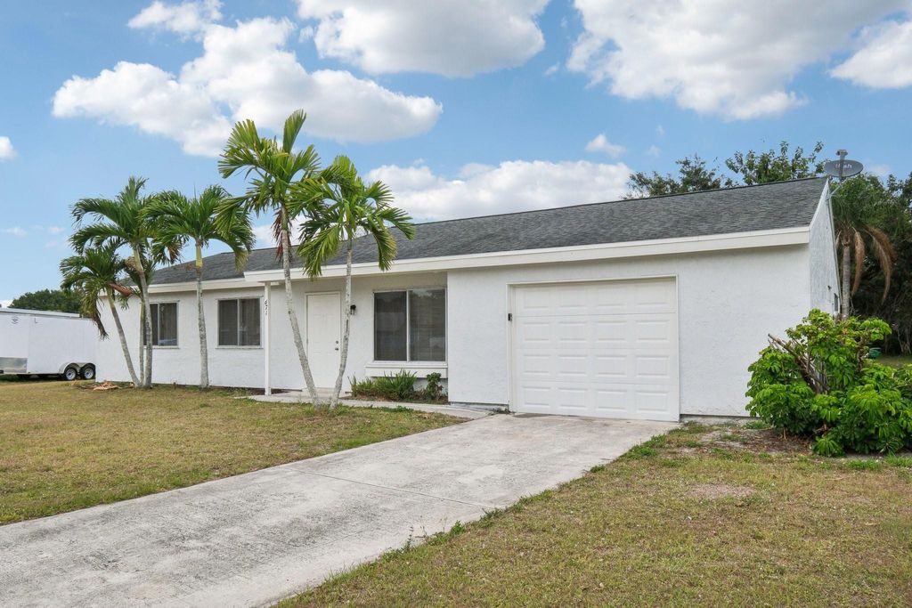 Photo of 671 SW Old Briar Avenue, Port Saint Lucie, FL 34953 (MLS # F10502290)