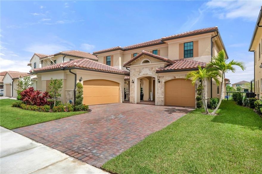 Spectacular & Tastefully upgraded Lakefront POOL home located in the sought after Parkland Bay community. It features a beautiful courtyard, heated resort style saltwater pool with a roomy SPA overlooking the lake.  Summer Kitchen, Marble deck and artificial turf grass creating spacious backyard for outdoor activities. Enter and be vowed by its high volume ceiling and two magnificent crystal chandeliers. First level of this two-story home is host to a formal dining room that seamlessly leads into an open floorplan family room and kitchen, while the expansive covered terrace is perfect for entertaining. A first-floor bedroom is ideal for overnight guests, and the remaining four bedrooms occupy the second level.