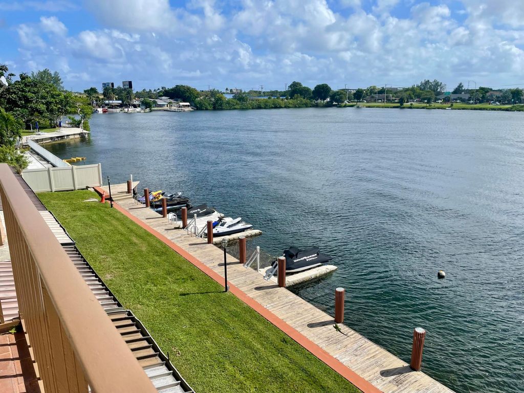 Photo of 1100 Crystal Lake Drive #207, Deerfield Beach, FL 33064 (MLS # R11158492)