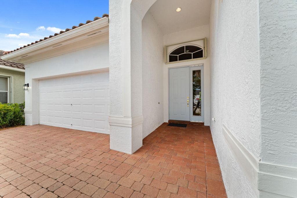 Photo of 879 SW Pebble Lane, Palm City, FL 34990 (MLS # R11100973)