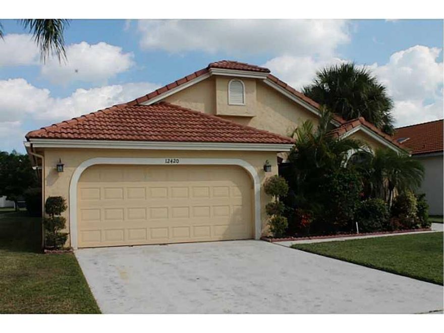 This gorgeous and modern style home is beautifully maintained. This home features an updated kitchen w/granite counter tops & stainless steel appliances. Wood look Tile throughout the main areas. Oversized master bedroom and updated master bathroom. Lots of closet space. Two car garage, garage is finished with epoxy flooring, covered patio with an oversized lot. Great and quiet neighborhood. ALL AGES/NO MEMBERSHIP!