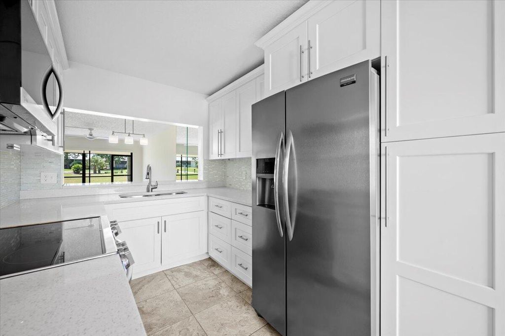 Photo of 101 Pinecrest Circle #A, Jupiter, FL 33458 (MLS # R11105183)