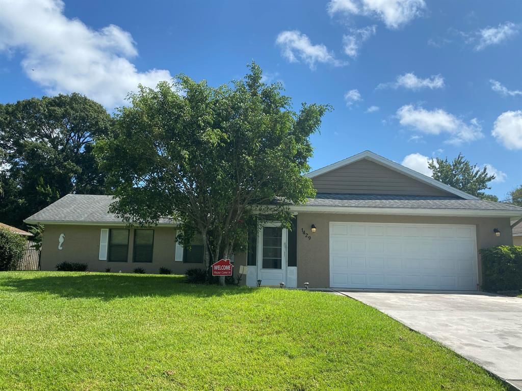 Photo of 1429 SE Proctor Lane Ln, Port St Lucie, FL 34983 (MLS # R10743027)