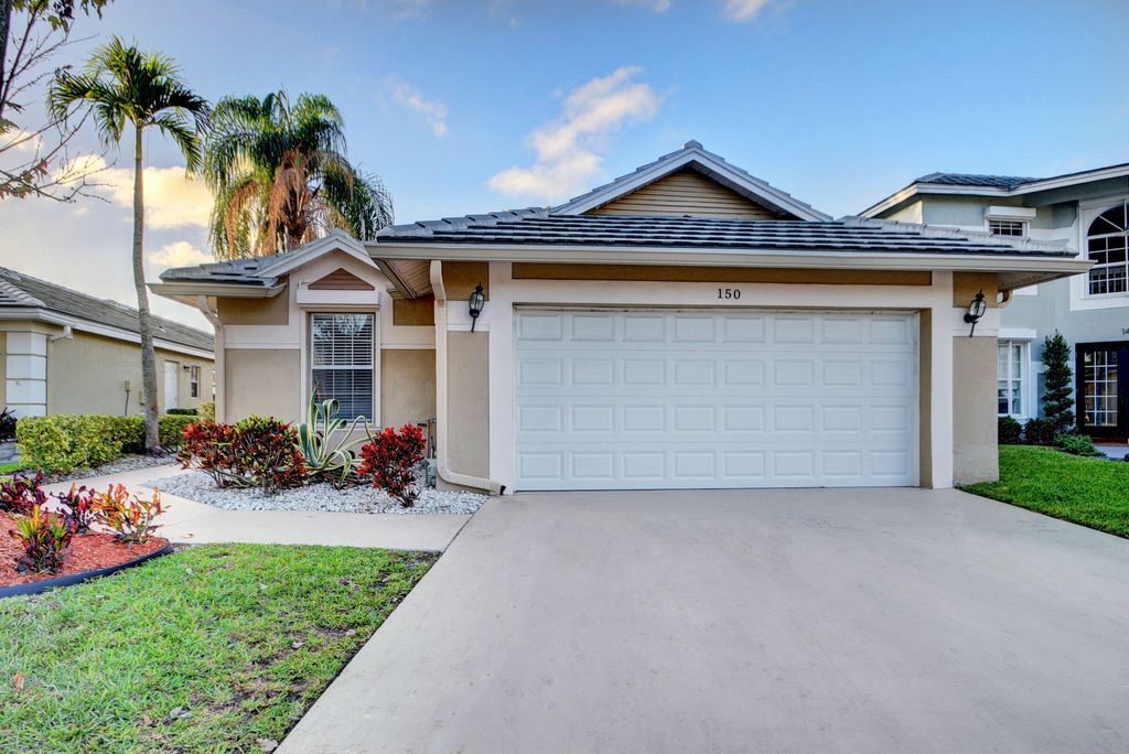 Photo of 150 Harbor Lake Circle, Greenacres, FL 33413 (MLS # B26025280)