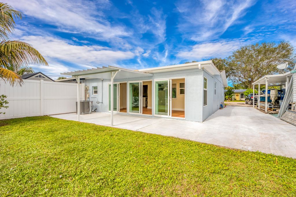 Photo of 100 SW Hideaway Place, Stuart, FL 34994 (MLS # R11162596)