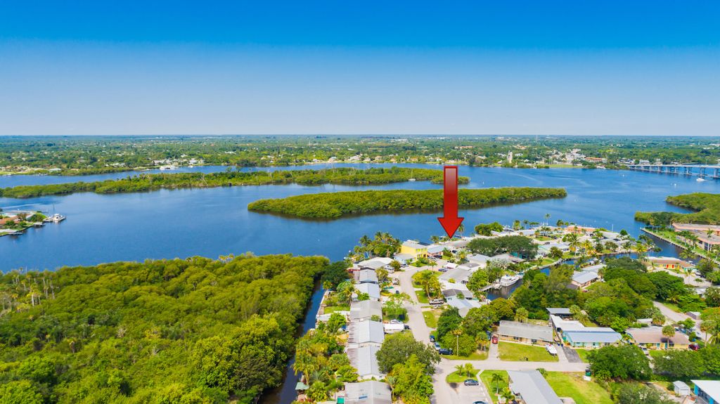 Photo of 100 SW Hideaway Place, Stuart, FL 34994 (MLS # R11162596)