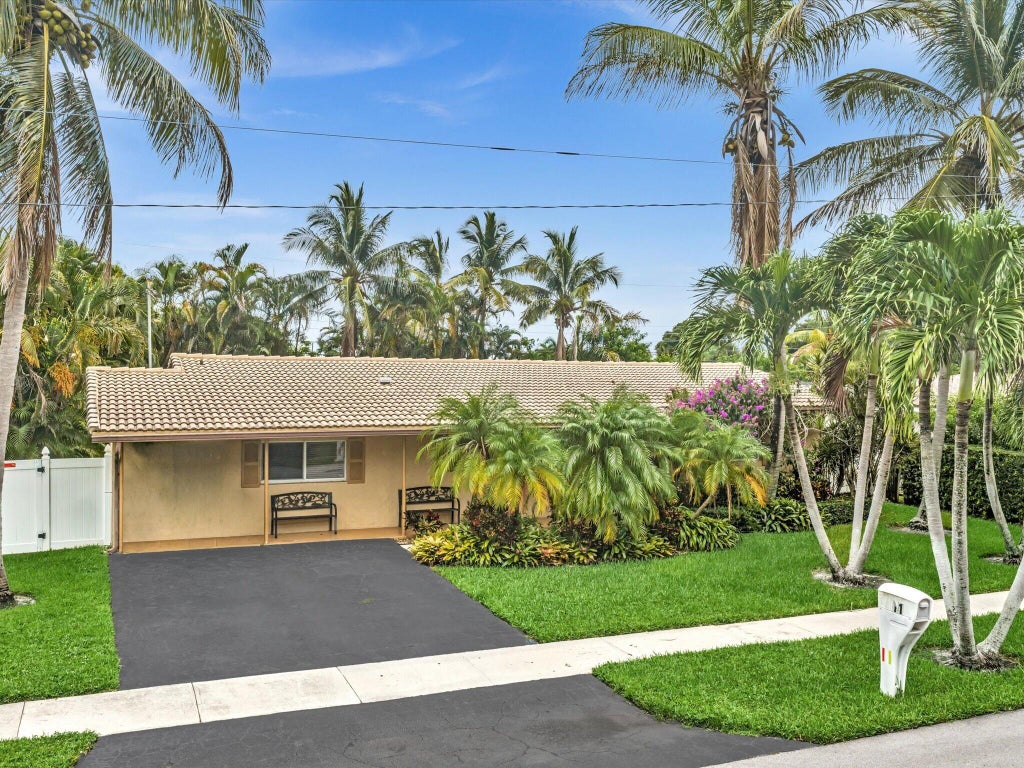 Photo of 11 FOREST HILLS Lane, Boca Raton, FL 33431 (MLS # B26060826)