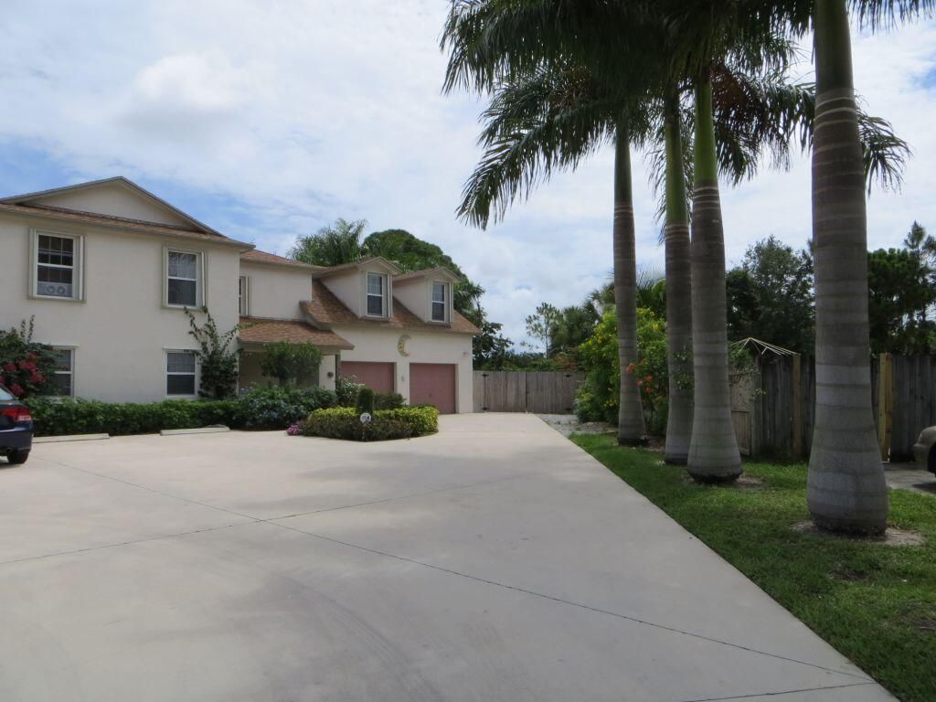 Photo of 9230 E Highland Pines Drive Dr, Palm Beach Gardens, FL 33418 (MLS # R10838192)