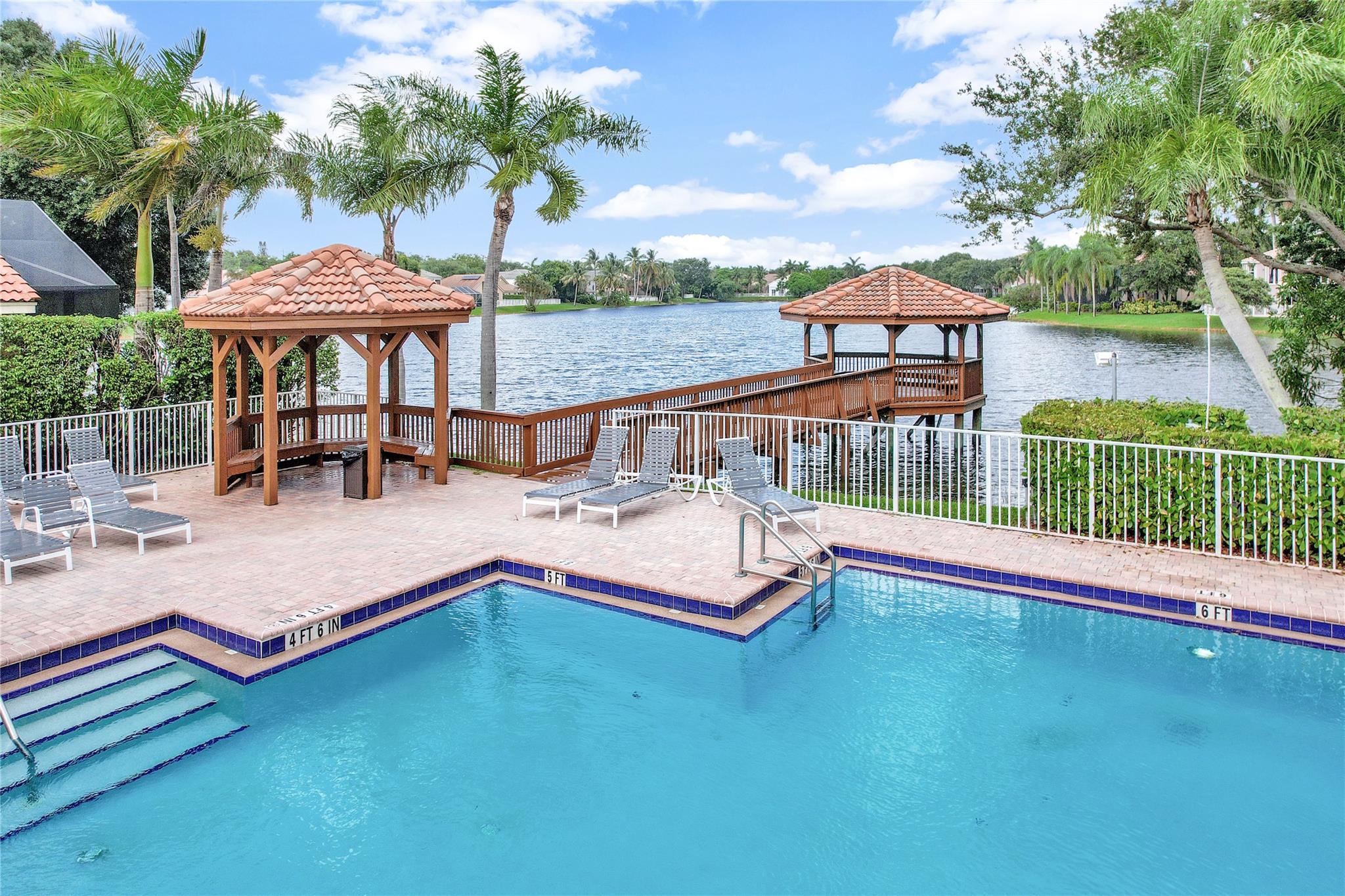 Your dream home in the heart of Parkland, top-rated schools and exceptional quality of life. This beautifully renovated 4-bedroom, 3-bathroom home blends modern luxury with everyday comfort. Located in a private, gated community with a lake, a pool, and a children's playground. Inside, you'll find a bright and spacious layout with high ceilings and oversized windows that fill the home with natural light. The stunning gourmet kitchen features high-end hidden appliances, custom cabinetry, and elegant quartz countertops, an expansive primary suite, complete with a walk-in closet, spa-like ensuite bathroom, & a relaxing jacuzzi tub. Step outside to the outdoor area, to a canopy-covered patio, perfect for entertaining. A covered 2-car garage plus space for 2+ more vehicles in the front driveway
