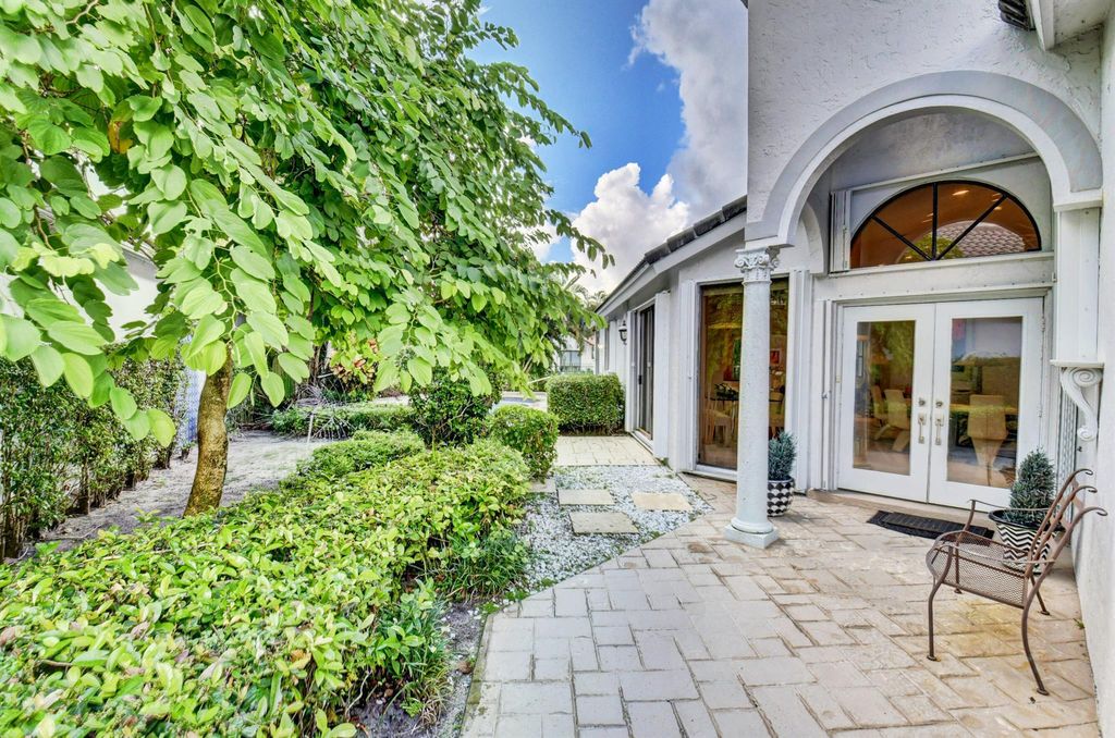 Photo of 2106 NW 60th Circle, Boca Raton, FL 33496 (MLS # R11080178)