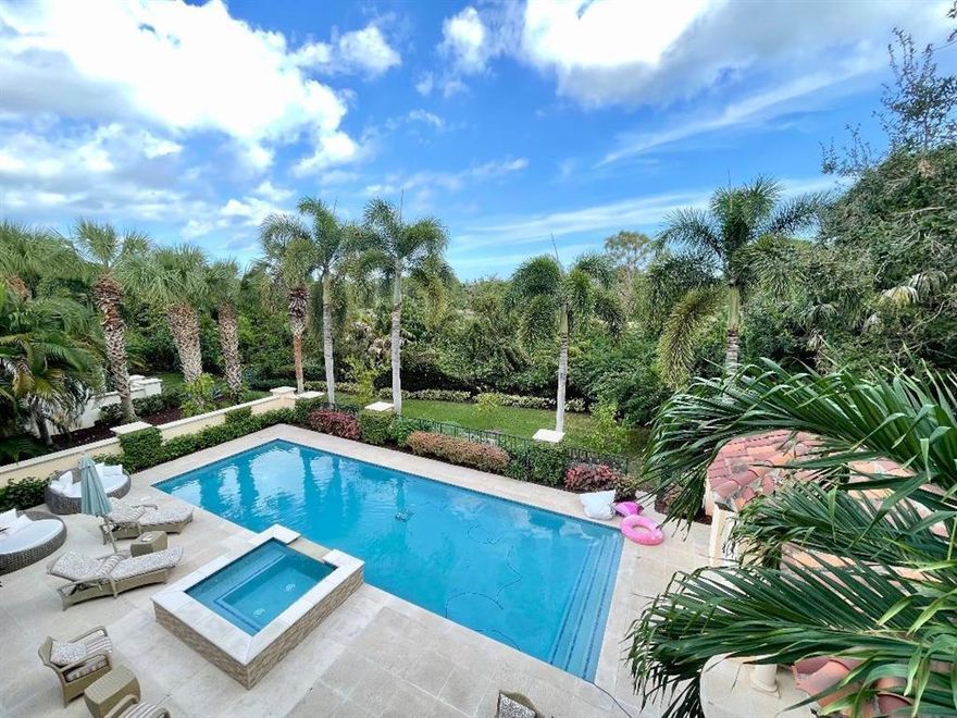 THIS CUSTOM ESTATE HAS IT ALL! PRIVATE almost 1/2 acre corner lot. Newly renovated throughout w/contemporary coastal flair. Loaded w/upgrades! Expansive 1st floor primary suite w/sitting room, exquisite bath, custom closets. Media room w/wet bar. Office w/sleek builtins. New chefs kitchen w/stainless steel appliances and large quartz  island breakfast bar. Endless space for outdoor seating around new resort style heated pool/spa. Impact windows/doors. Wood floors throughout.  Separately gated within the gates formerly Ritz Carlton. Lushly landscaped w/panoramic views of the 8th green. Summer kitchen.  Approval for expanded guest house. Five-star amenities. Full concierge service, full landscaping, twice weekly pool service. No mandatory club membership Jack Nicklaus golf course