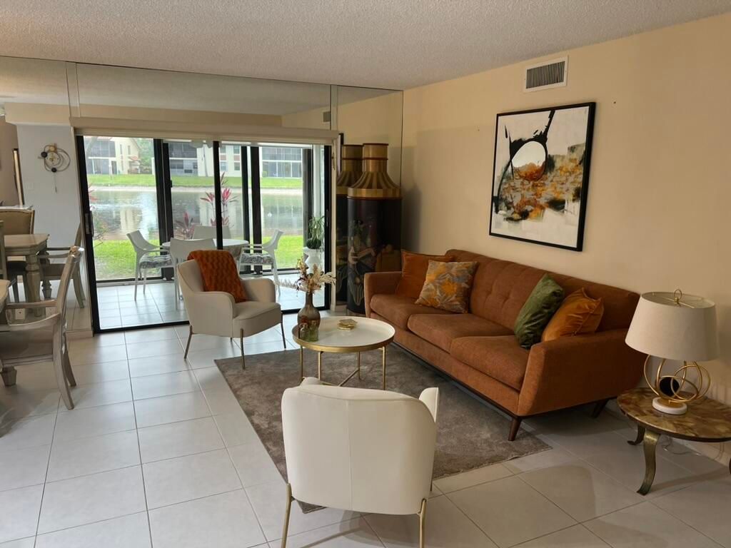 Photo of 10447 S Circle Lake Drive #101, Boynton Beach, FL 33437 (MLS # B26017758)