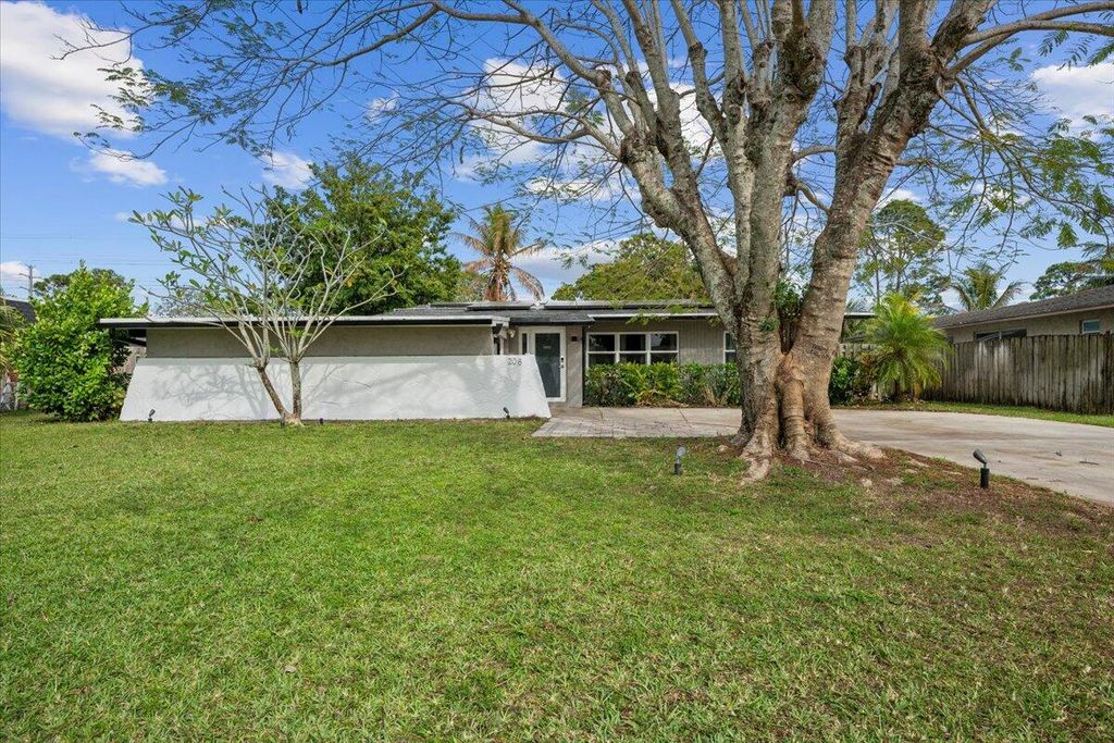 Photo of 208 Sandpiper Avenue, Royal Palm Beach, FL 33411 (MLS # B26002947)