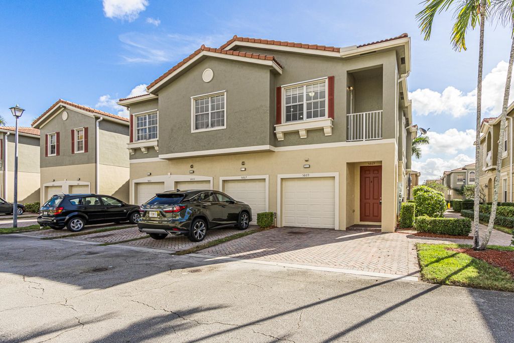 Photo of 5869 Hampton Hills Boulevard, Tamarac, FL 33321 (MLS # B26001413)