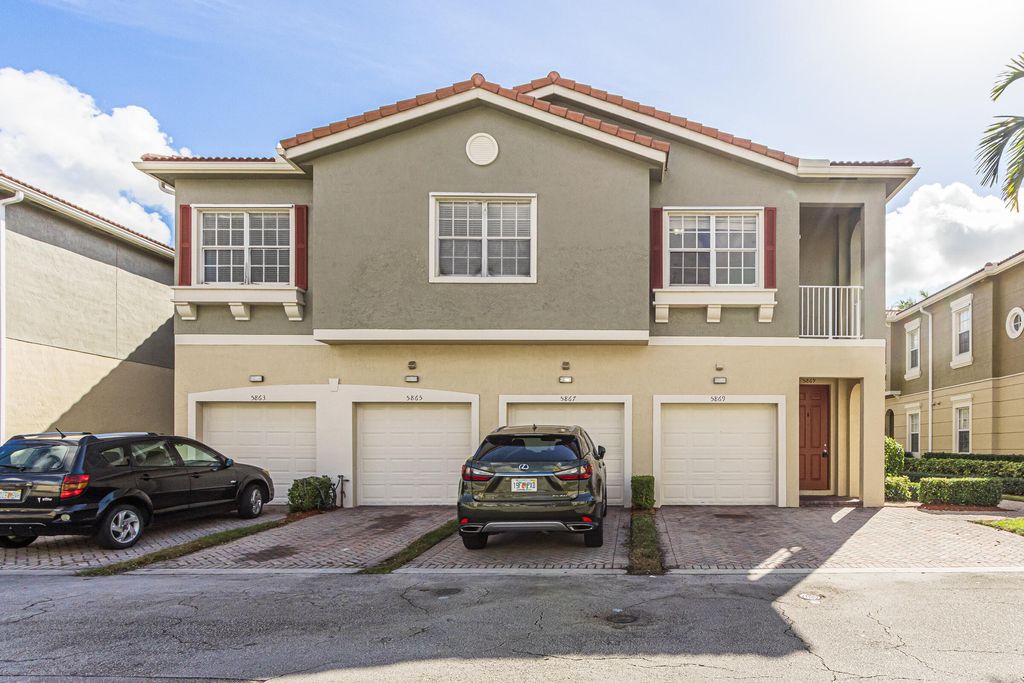 Photo of 5869 Hampton Hills Boulevard, Tamarac, FL 33321 (MLS # B26001413)