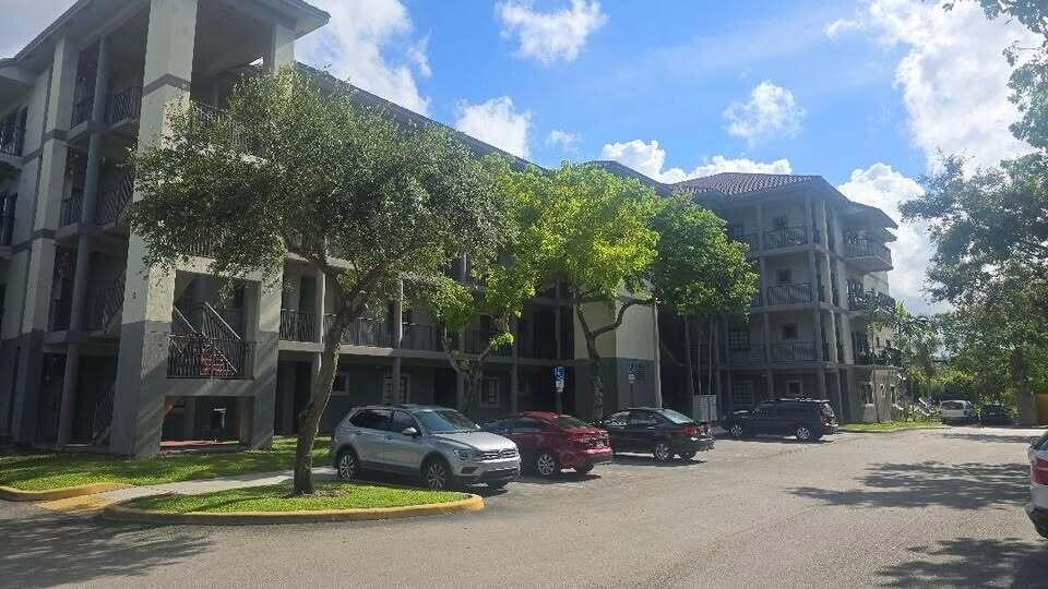 Photo of 2801 RIVERSIDE Drive #107-S, Coral Springs, FL 33065 (MLS # B26072222)