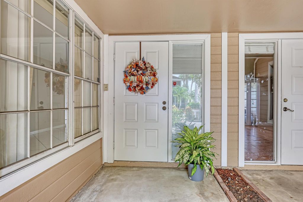 Photo of 5303 Buckhead Circle #102, Boca Raton, FL 33486 (MLS # R11050849)