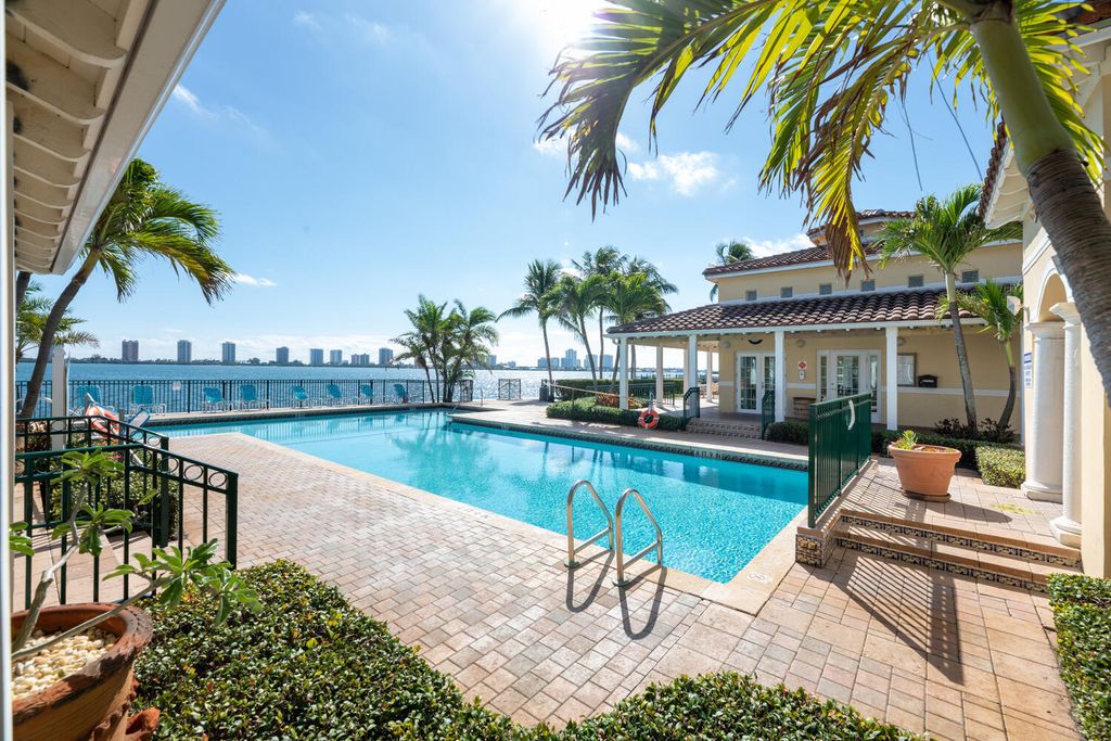 Photo of 1010 Lake Shore Drive #206, Lake Park, FL 33403 (MLS # R10965649)