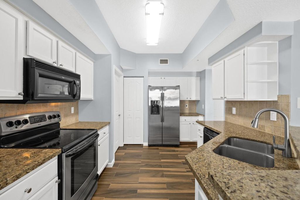 Photo of 225 Murcia Drive #102, Jupiter, FL 33458 (MLS # R10952704)