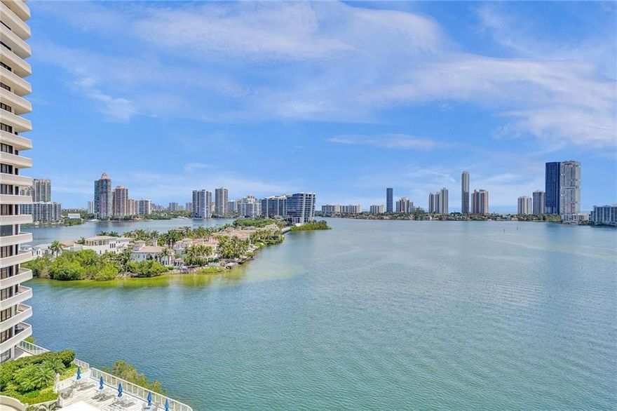 SUNRISE & SUNSET! RARE FLOW-THRU UNIT in THE 2800 BUILDING! BREATHTAKING EAST & WEST VIEWS of ISLAND ESTATES, INTRACOASTAL/BAY, SUNNY ISLES BEACH, OCEAN, POOL & MAULE LAKE. FOYER ENTRY leads to SPACIOUS EAST FACING LIVING ROOM & WEST FACING DINING ROOM. EAT IN KITCHEN features granite counters/backsplash, stainless steel appliances, wood cabinets & sunny breakfast area. ELEGANT PRIMARY BEDROOM opens onto EAST BALCONY & offers built out WALK IN CLOSET & 2nd CLOSET. LUXURIOUS BATHROOM with JACUZZI TUB, DOUBLE VANITY, BIDET & WINDOWED SHOWER. SPLIT BEDROOM DESIGN features LARGE GUEST ROOM opening to WEST BALCONY, 2 CLOSETS & ENSUITE BATH. NEWER VANITIES, ALL MARBLE FLOORS, BAMBOO FLOORS IN BEDROOMS, 2 HUGE GLASS PROTECTED BALCONIES! ENJOY 5 STAR RESORT/COUNTRY CLUB LIVING on WILLIAMS ISLAND!
