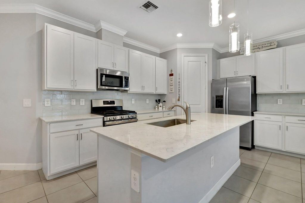 Photo of 521 SE Plumeria Drive, Port Saint Lucie, FL 34984 (MLS # R11099103)