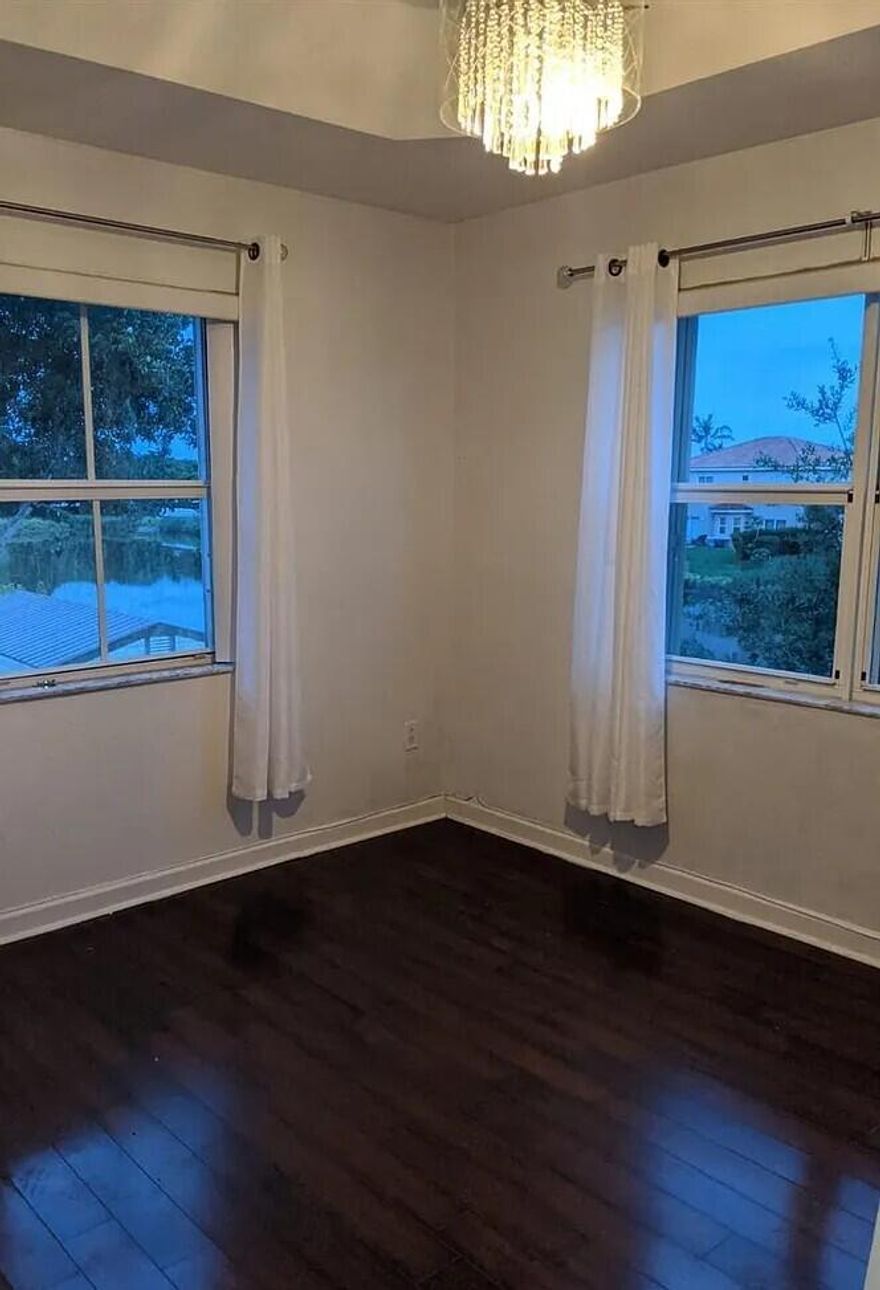 3 Bed / 3 Bath Townhouse with Lake Views - Opportunity in Malibu Bay. Located in the desirable Malibu Bay community, this 3 bedroom, 3 full bath townhouse offers a rare chance to create value. Featuring lake views from the patio and master bedroom, solid layout, and strong location this property is ready for someone to bring it back to life.  Enjoy a well-maintained community with pool, fitness center, clubhouse, and play area. Walking distance to Homestead Hospital and just minutes from shopping, restaurants, and major highways