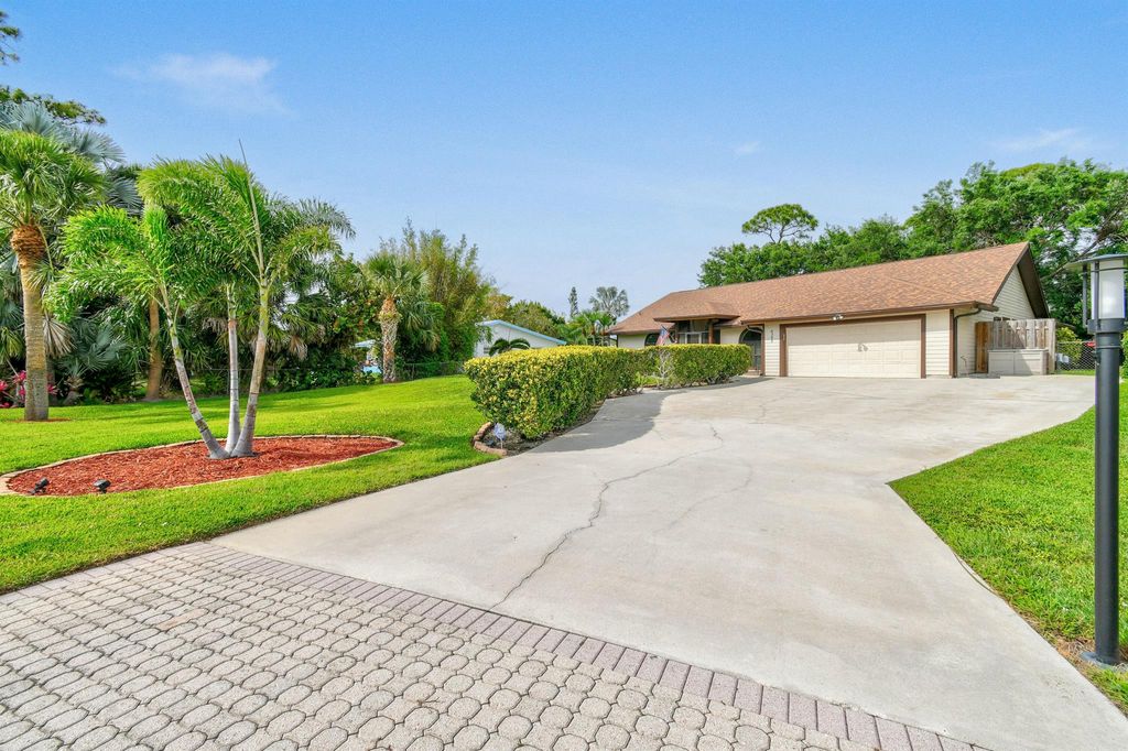 Photo of 6385 SE Circle Street, Hobe Sound, FL 33455 (MLS # R11096136)