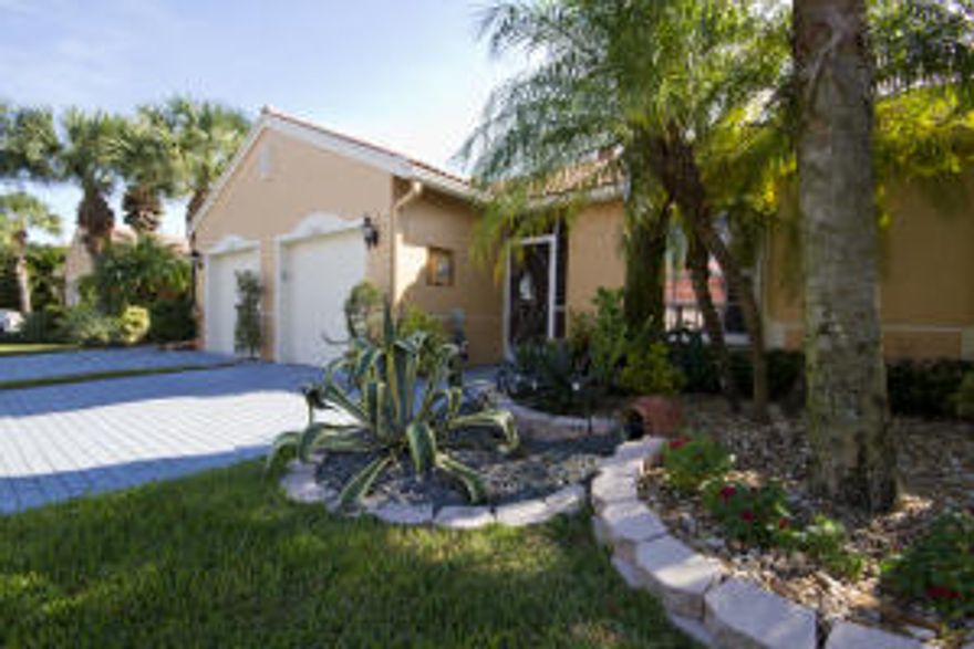 PICTURE PERFECT! BEAUTIFULLY BRIGHT AND NEUTRAL. CUSTOM KITCHEN WITH THE WALL OPENED. BEAUTIFUL GRANITE, 2 SKYDOMES, EXTENDED PATIO OVERLOOKING THE LAKE TO ENJOY THE MOST BEAUTIFUL SUNRISES. NEWER A/C NEW REFRIGERATOR, NEW WASHER, DRYER IS NOT ORIGINAL, NEW WATER FILTER ,NEW ACCORDION SHUTTERS, TILED FLOORS, CRISP AND CLEAN, ON A PRIVATE AND QUIET STREET. VENETIAN ISLES IS A FABULOUS ACTIVE LIFESTYLE COMMUNITY THAT BOASTS A BEAUTIFUL RESORT STYLE CLUBHOUSE WITH A BEAUTIFUL LOBBY LEADING TO A FABULOUS POOL AREA WITH A LARGE RESISTANCE POOL, BEAUTIFUL OLYMPIC POOL,LARGE COVERED VERANDAS OVERLOOKING A HUGE LAKE, FANTASTIC TENNIS, OSIZED EXERCISE RM W/STATE OF THE ART EQUIPMENT, AEROBICS RM, CLUB ROOMS, CARD ROOMS, BILLIARDS, SOCIAL HALL, AND MORE! SHOWS,GAMES,CLUBS,FUN GALORE.