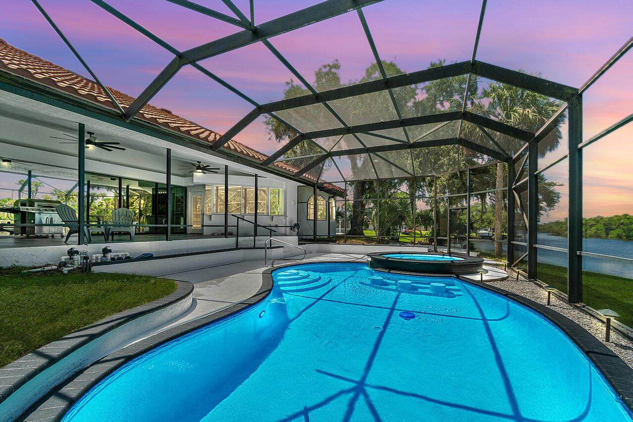 Experience the Magic of Waterfront Living! With direct ocean access, this is a boater's dream come true. Welcome to your personal slice of paradise--where the serene rhythm of the river meets the allure of the Atlantic. This exceptional waterfront & pool home offers unrivaled ocean access, perfect for boating, jet skiing, sunset cruises, + more. Spanning over 3,000 sq ft under air, 4 Bedrooms + Den, every inch of this residence is designed to elevate your lifestyle, blending elegance with the laid-back charm of coastal Florida living. Enjoy panoramic water views, a large pool, gentle coastal breezes, & unforgettable evenings spent on the water's edge. You can host vibrant gatherings or enjoy quiet, breezy nights under the stars, this is more than just a home--it's a waterfront sanctuary.