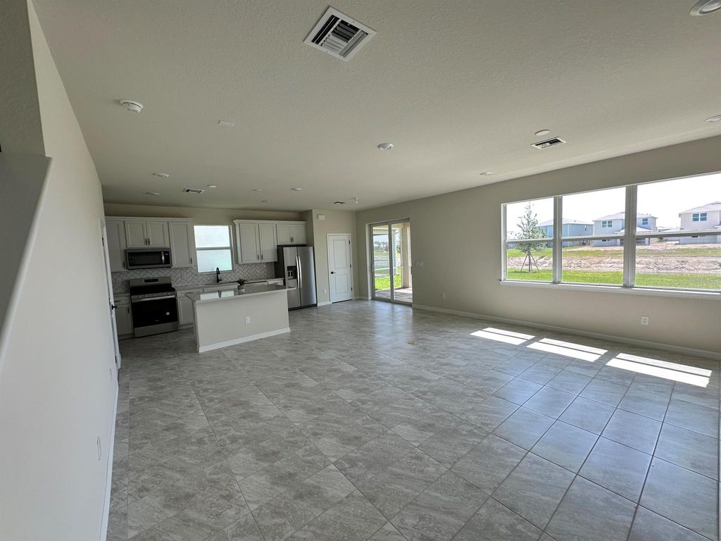 Photo of 12259 SW Myrtle Oak Drive, Port Saint Lucie, FL 34953 (MLS # R10965006)