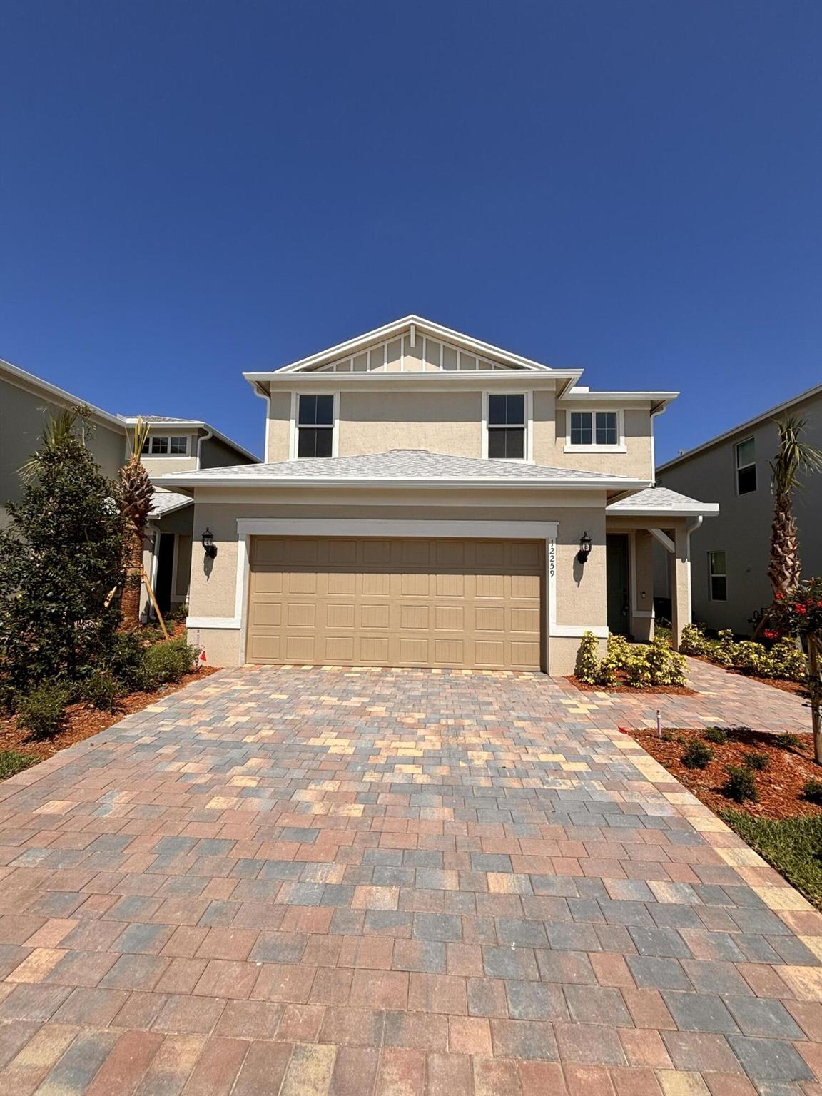 Welcome to modern living at its finest! This brand new lake view home features a spacious open concept living and dining area and kitchen with all new high quality appliances. Upgraded fixtures and hardware throughout the home, quartz countertops, screened in covered lanai and impact windows. The upstairs level has 3 bedrooms, 2 bathrooms, a middle sitting area and a roomy laundry room with a washer and cabinets. Rent includes lawn care & irrigation, basic cable, internet, modern Ring doorbell, and home alarm monitoring by Blue Stream Co...All included!
